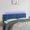 sengegavl med LED-lys 144x5x78/88 cm fløjl mørkeblå