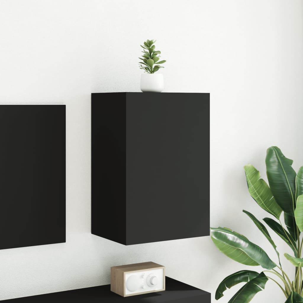 væghængt tv-bord 40,5x30x60 cm konstrueret træ sort