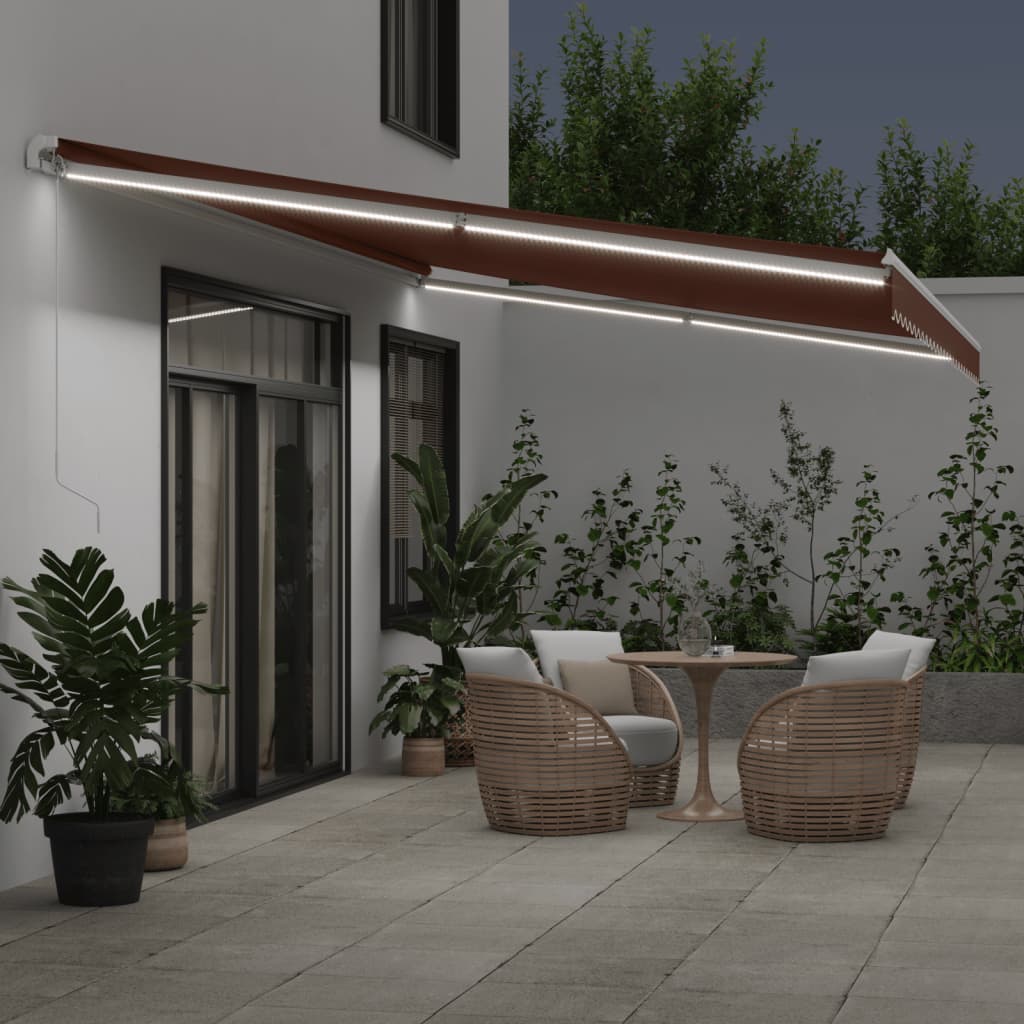markise med LED-lys 600x350 cm manuel betjening brun